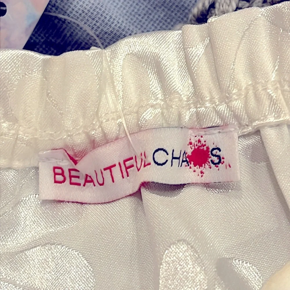 NWT Beautiful Chaos Junior dress. Poly/spandex Medium in white jacquard. - Picture 3 of 5